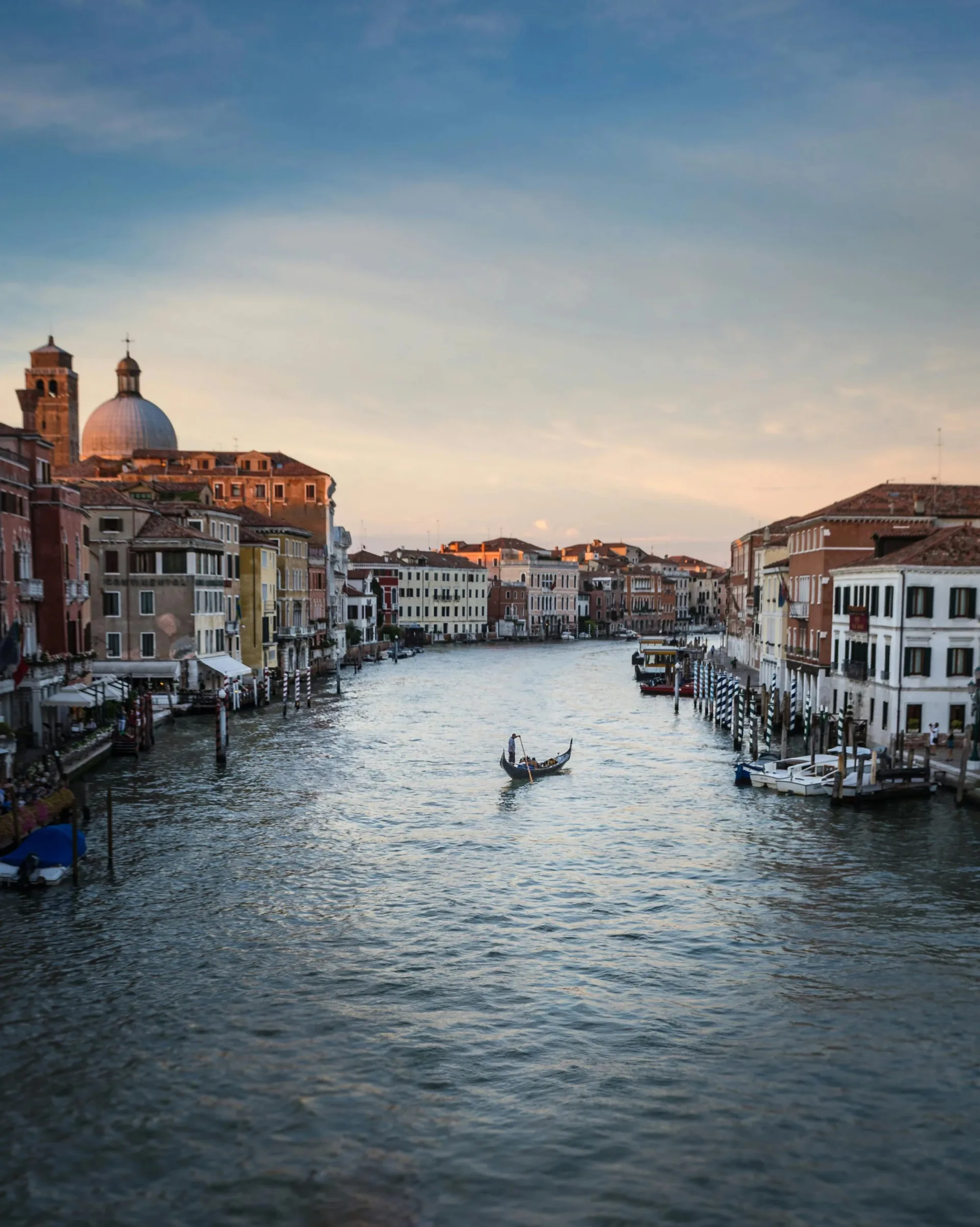 Venice canal at dusk, representing European literary culture